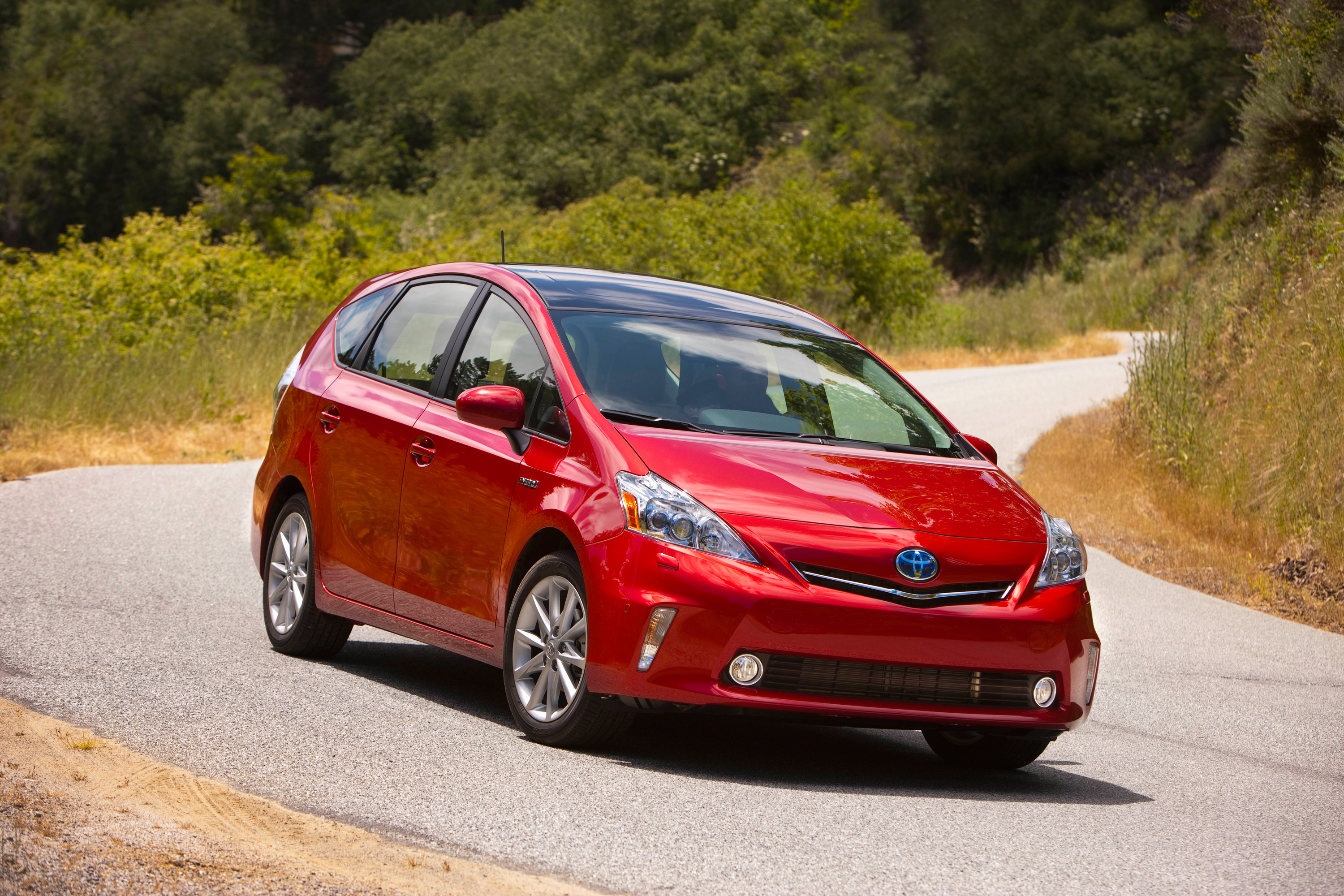Fast Take: 2013 Toyota Prius v Model Three - TFLcar